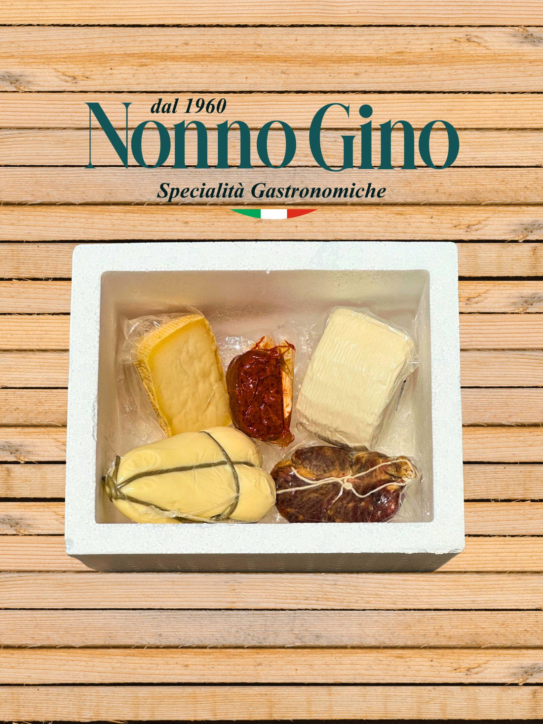 Handcrafted package from Calabria featuring a selection of traditional cured meats and cheeses